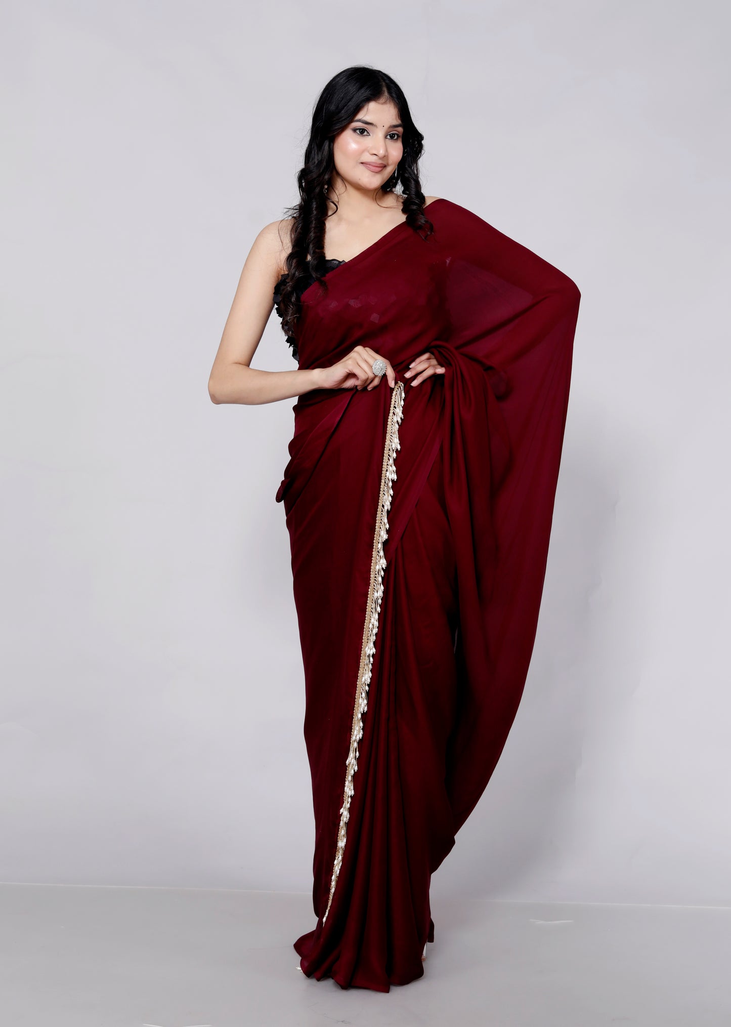CREPE PLAIN TASSELS WORK MAHROON SAREE BY SKFBHOLUBHAI