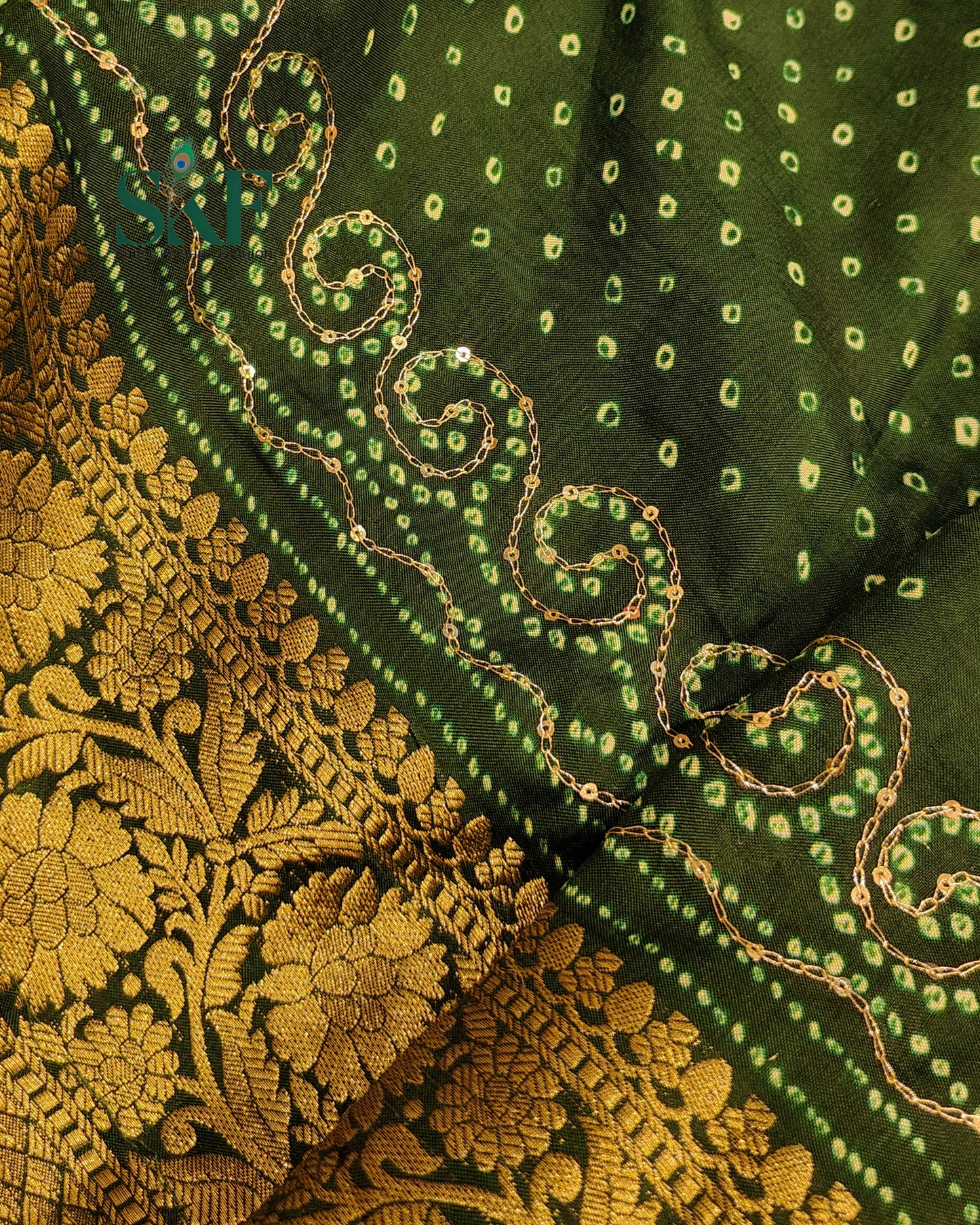 HO SILK BHANDHANI PEACOCK MOTIF AARI AND SEQUENCE WORK BOTTLE GREEN SAREE BY SKFBHOLUBHAI