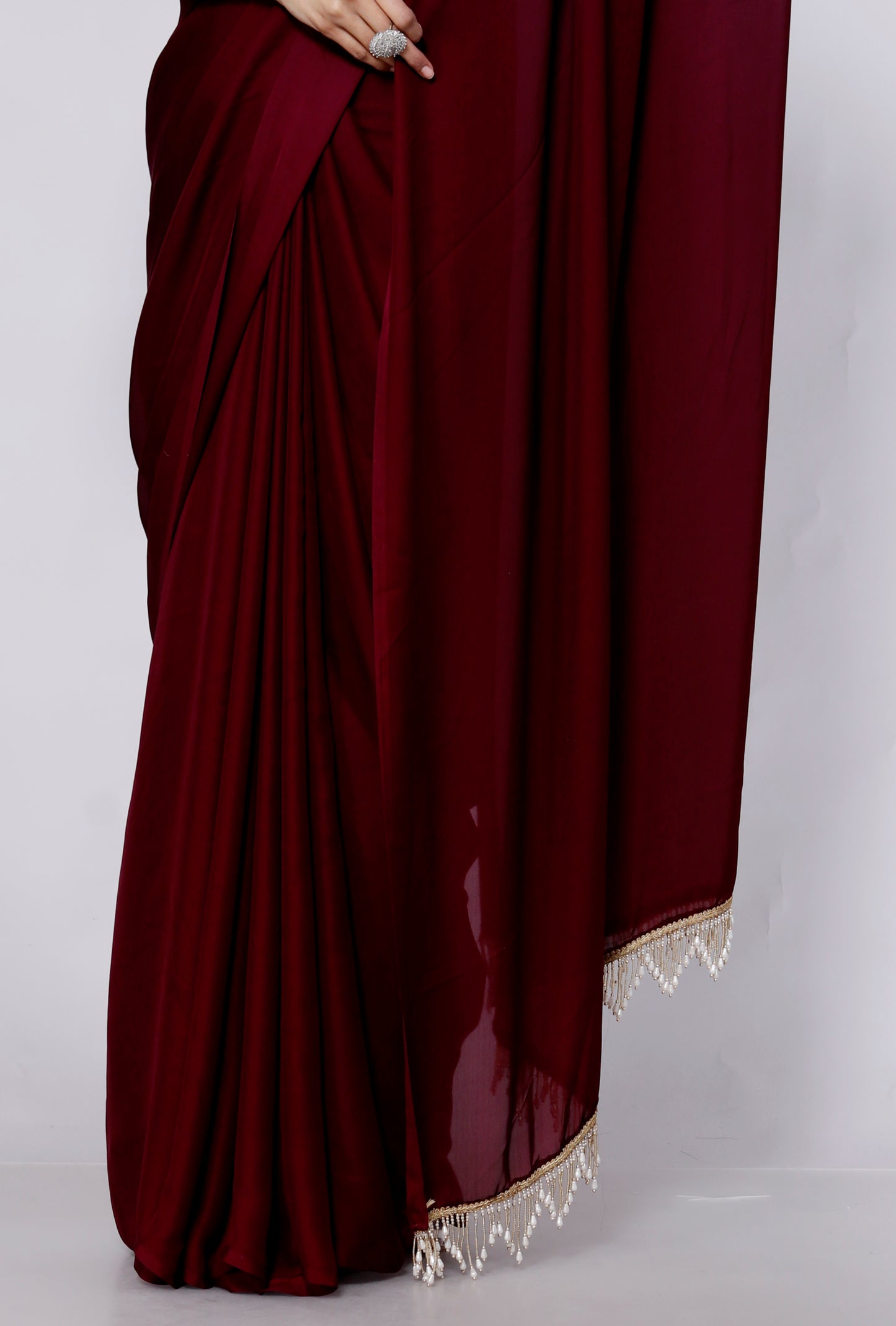 CREPE PLAIN TASSELS WORK MAHROON SAREE BY SKFBHOLUBHAI
