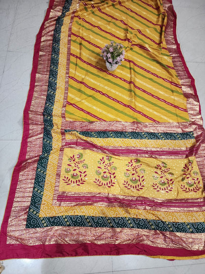 SAWAN LEHARIYA YELLOW COLOUR WITH FOIL AND DOLA CRUSH FABRIC BY SKFBHOLUBHAI