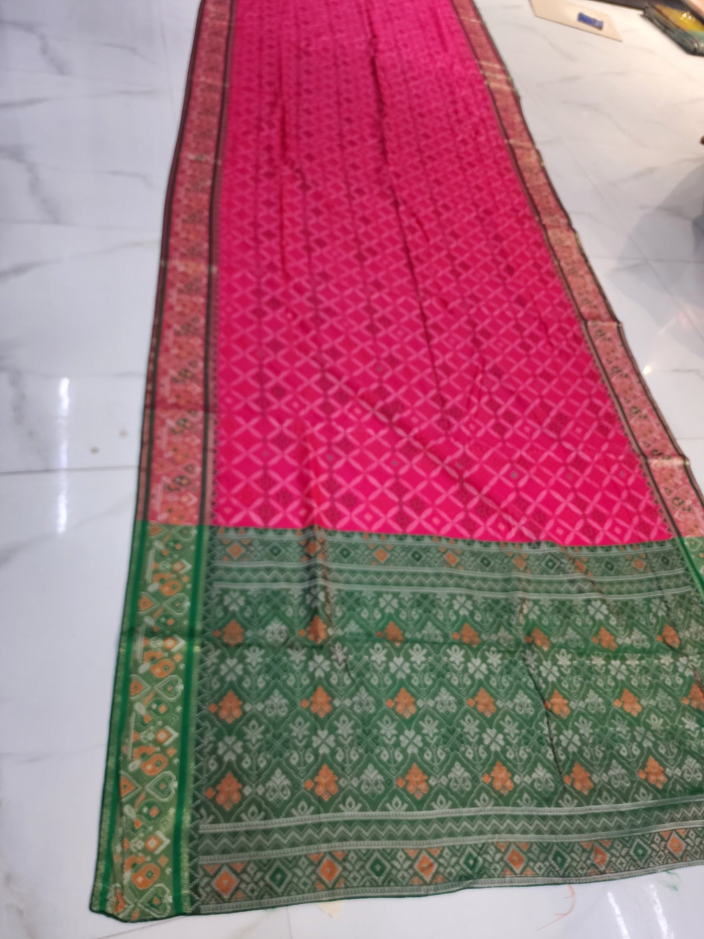 PARTYWEAR PATOLA PRINT SAREE BY SKFBHOLUBHAI