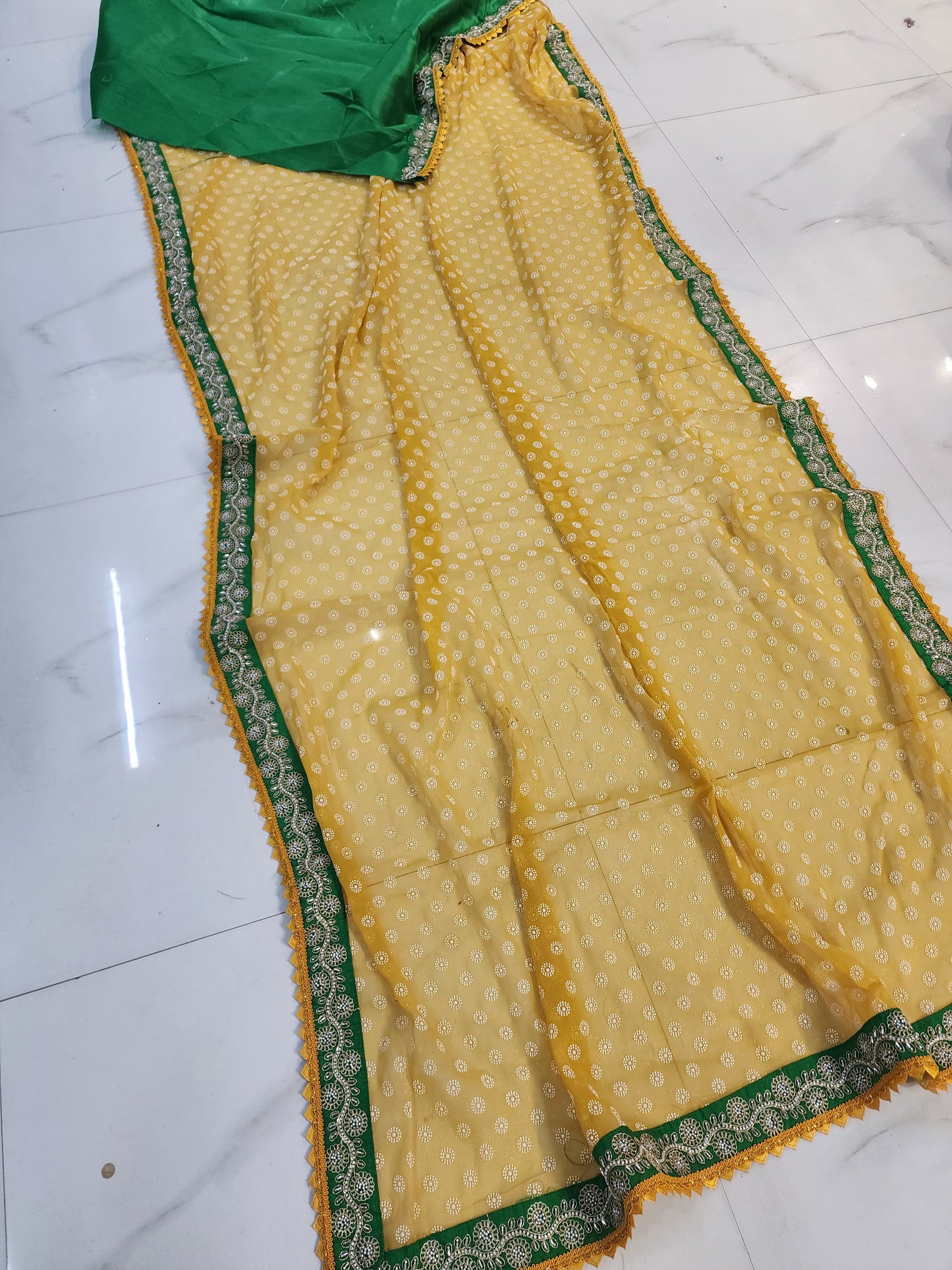 HALDI MEHANDI SPEICEL YELLOW GREEN BORDER SAREE BY SKFBHOLUBHAI