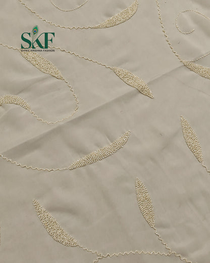 GEORGETTE IVORY KARDANA JAAL HANDWORK SAREE BY SKFBHOLUBHAI