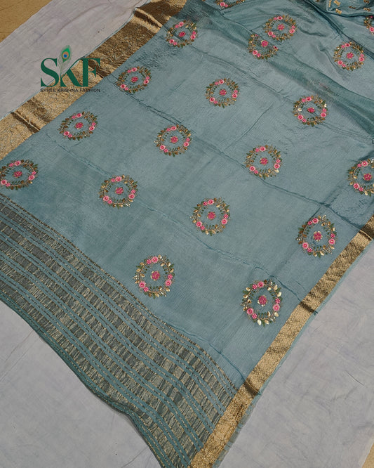 CHINON SEQUENCE EMBROIDERY WEAVING  WORK ICE BLUE SAREE BY SKFBHOLUBHAI