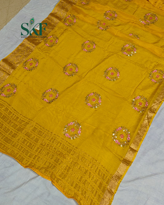 CHINON SEQUENCE EMBROIDERY WEAVING  WORK YELLOW SAREE BY SKFBHOLUBHAI