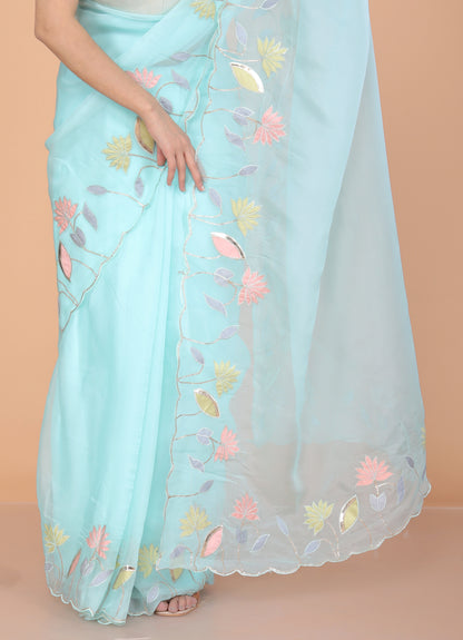 TISSUE APPLIQUE WORK DESIGNER SKY BLUE SAREE BY SKFBHOLUBHAI