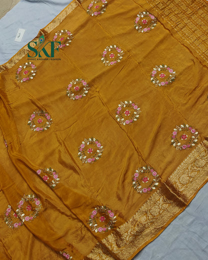 CHINON SEQUENCE EMBROIDERY WEAVING  WORK MUSTARD SAREE BY SKFBHOLUBHAI