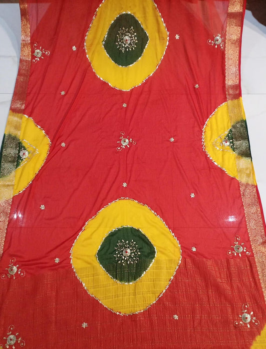 JAIPURI CHINON WITH KACHHA GOTA WORK GHEVAR BANDHEJ RED COLOUR SAREE