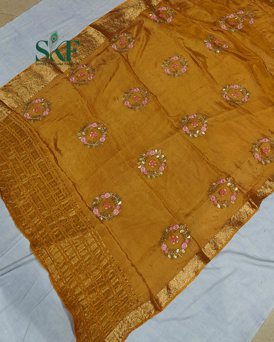 CHINON SEQUENCE EMBROIDERY WEAVING  WORK MUSTARD SAREE BY SKFBHOLUBHAI
