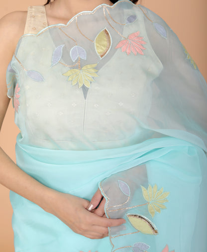 TISSUE APPLIQUE WORK DESIGNER SKY BLUE SAREE BY SKFBHOLUBHAI