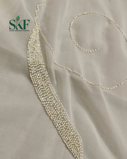 GEORGETTE IVORY KARDANA JAAL HANDWORK SAREE BY SKFBHOLUBHAI